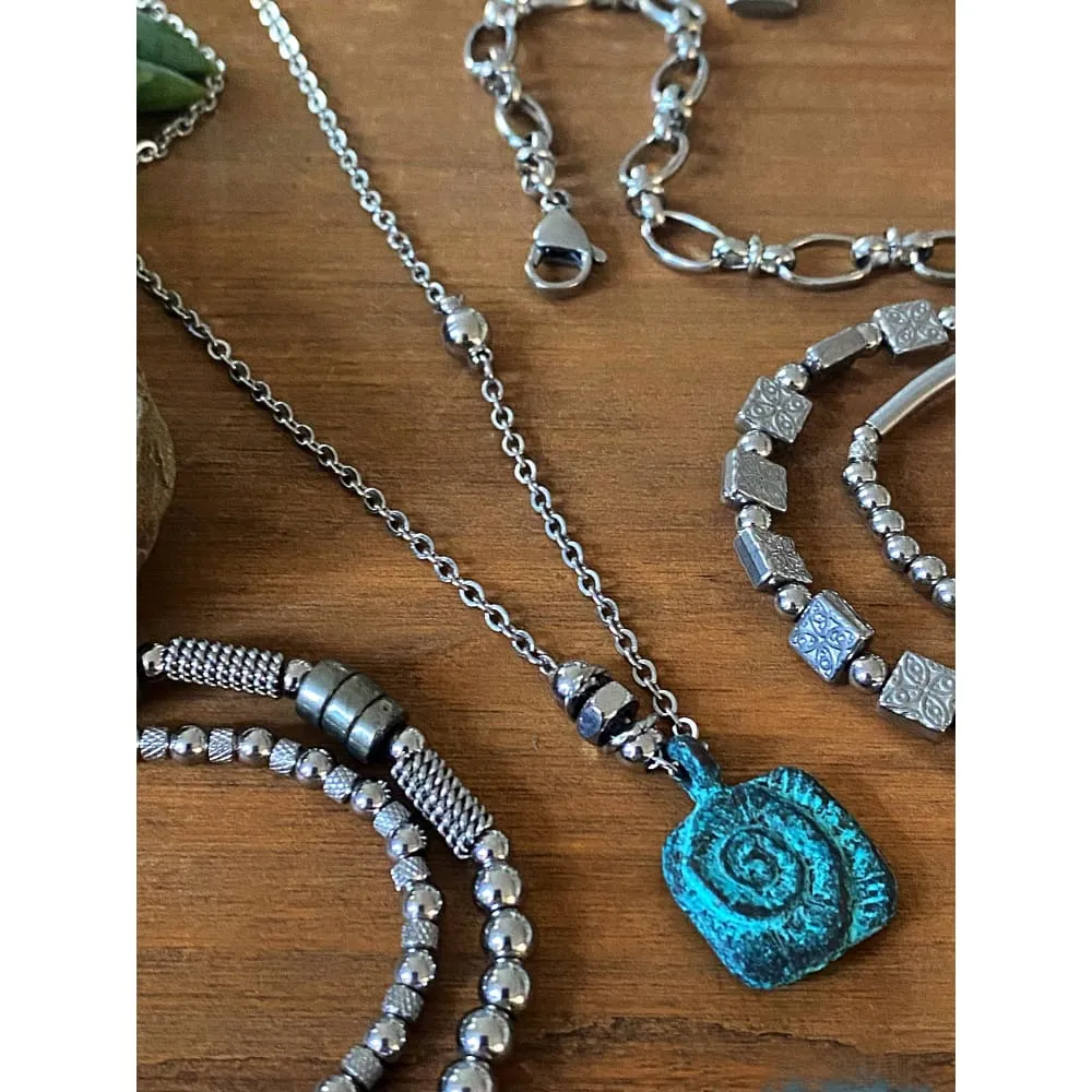 PATINA NAUTILUS NECKLACE