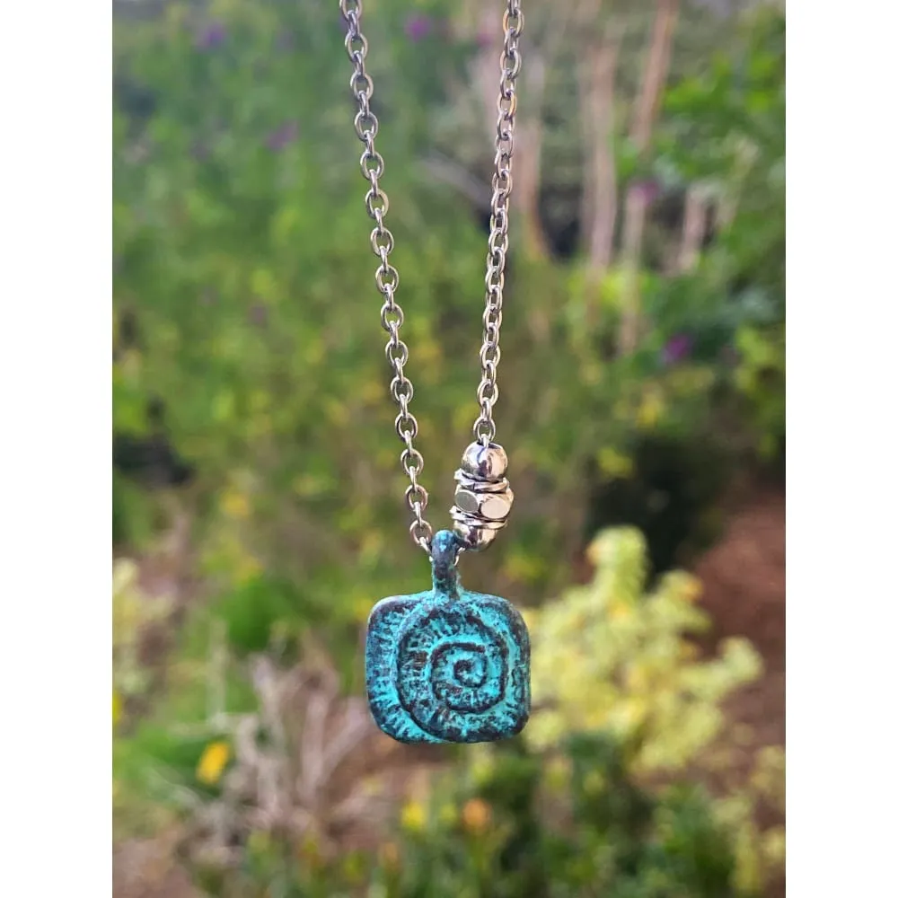 PATINA NAUTILUS NECKLACE