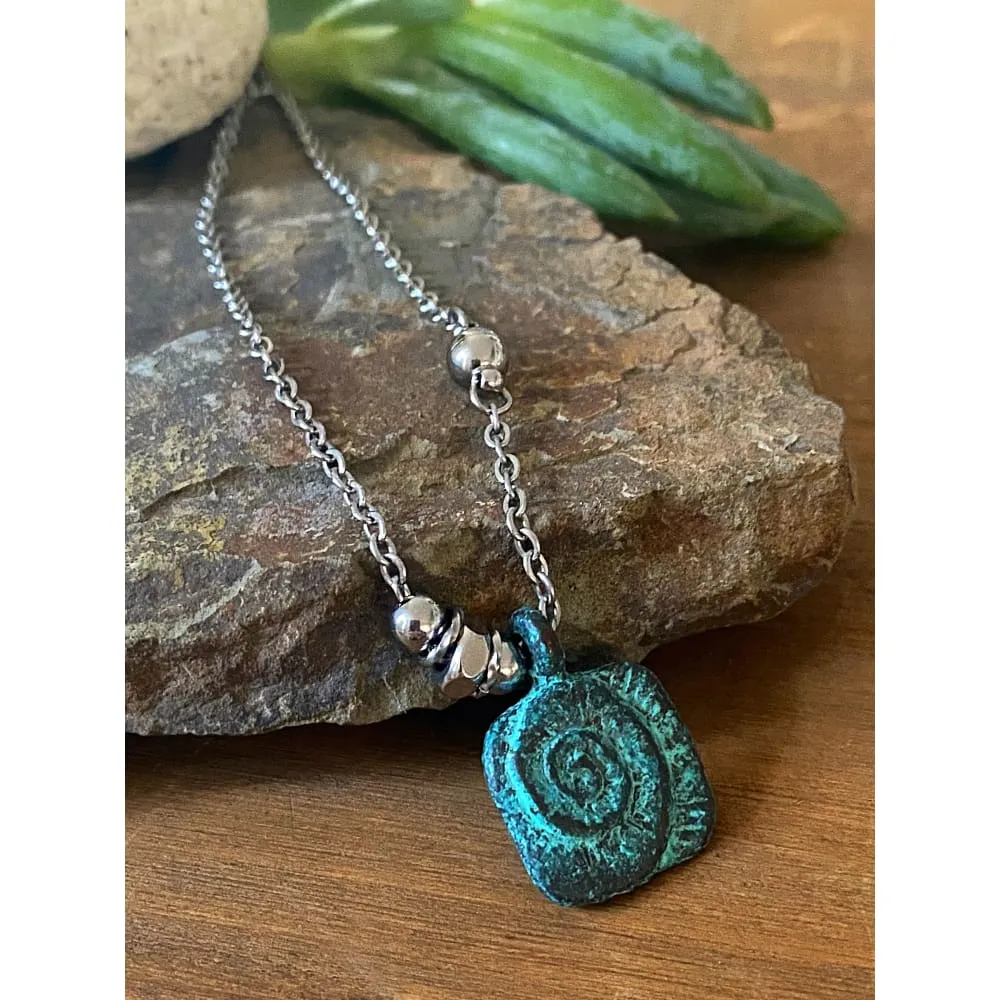 PATINA NAUTILUS NECKLACE