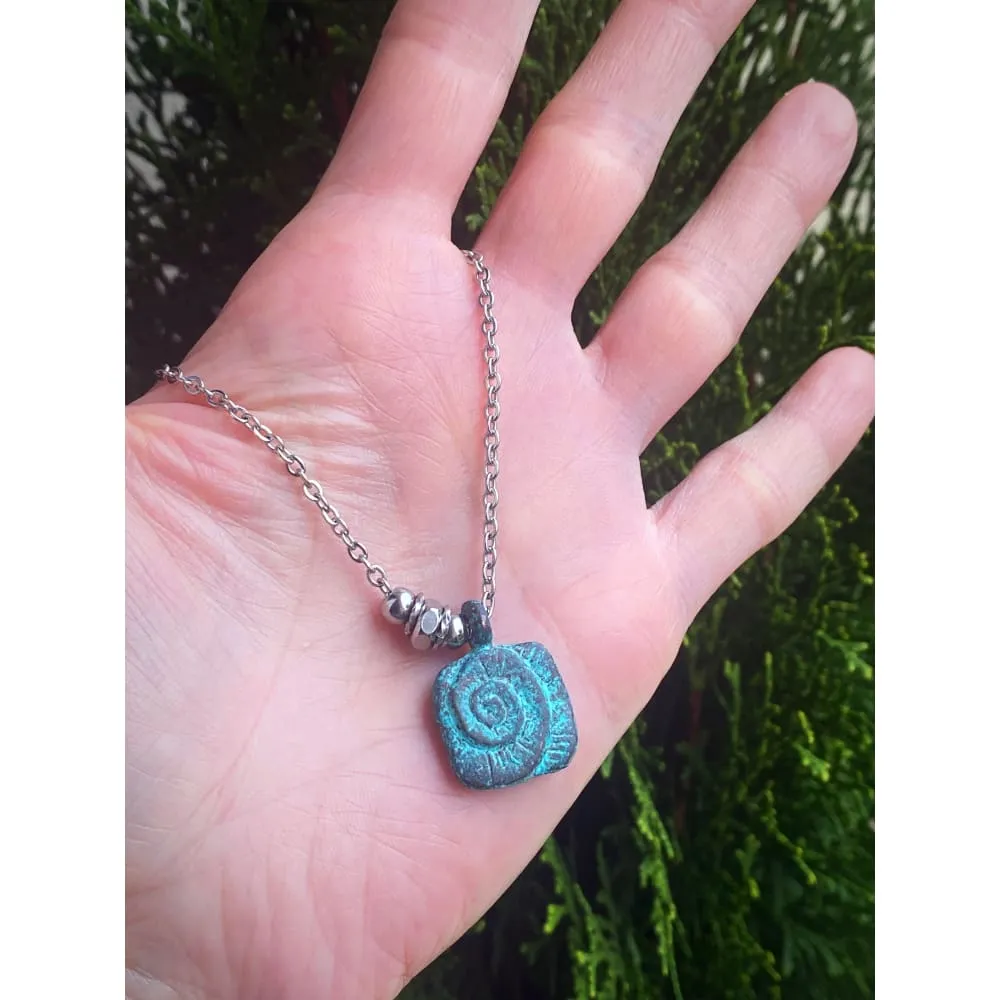 PATINA NAUTILUS NECKLACE